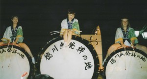 Sarah playing the Taiko drum in a town festival.